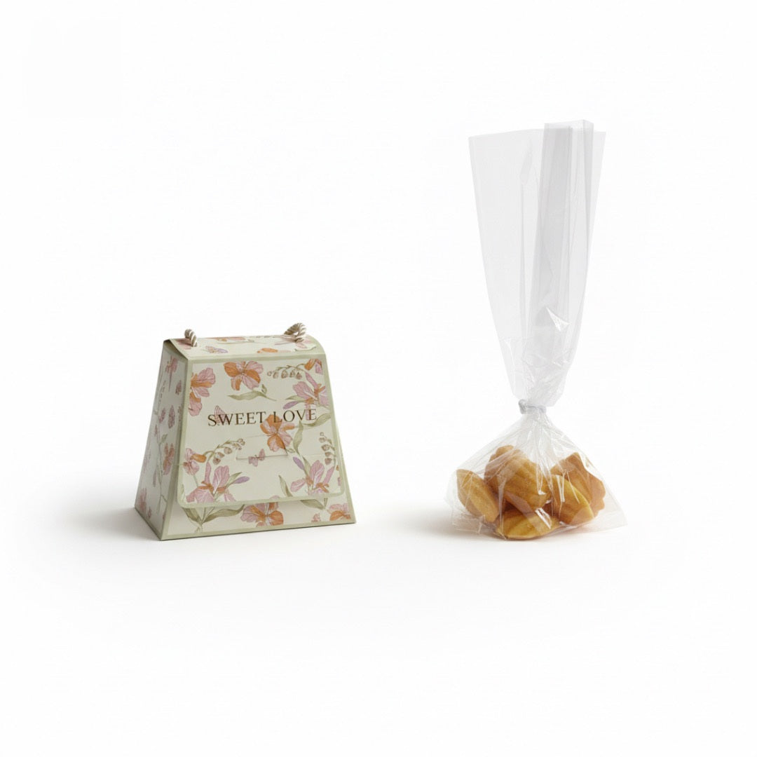 des fondants de cire de soja en forme de madeleine dans leur sachet plastique transparent.